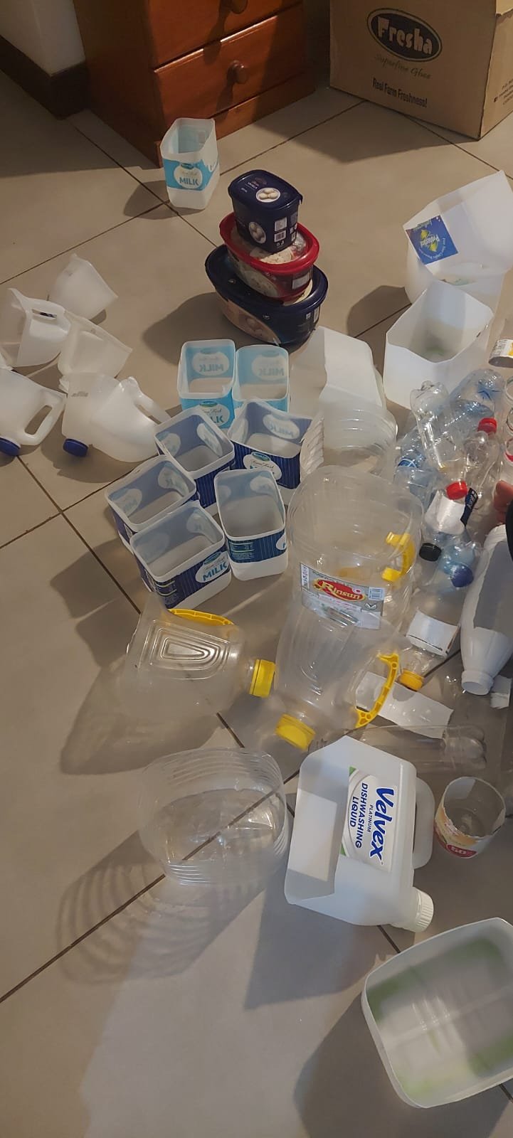 A bottle being cut open along a marked line